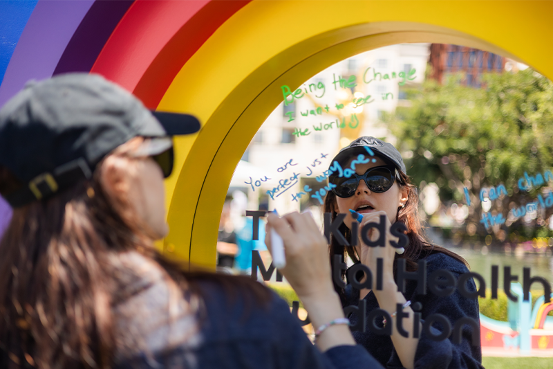 Alexandra Daddario writing a message of support for Kids Mental Health on mirror