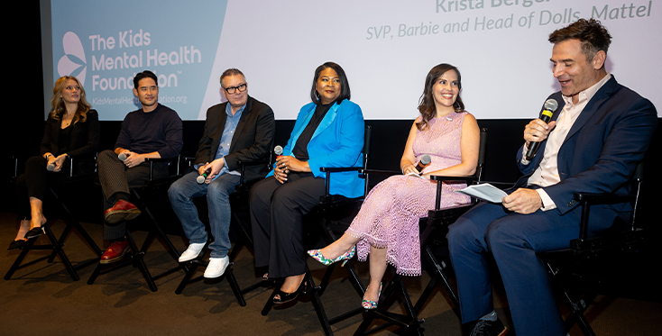 Panelists, including Dr. Ariana Hoet from The Kids Mental Health Foundation and industry leaders, speak during a 'Champions of Mental Health' event, discussing youth mental wellness and collaboration with partners like Mattel.