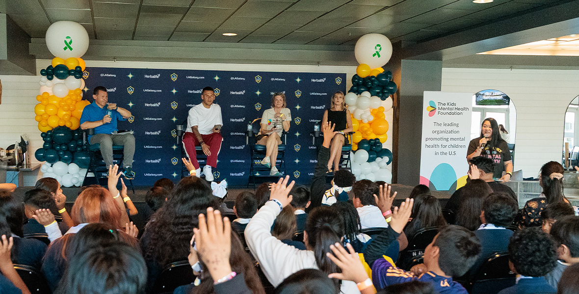 Christian Ramirez of LA Galaxy joins a Kids Mental Health Foundation panel discussion with students, educators, and community leaders, encouraging open conversations about mental wellness in schools.
