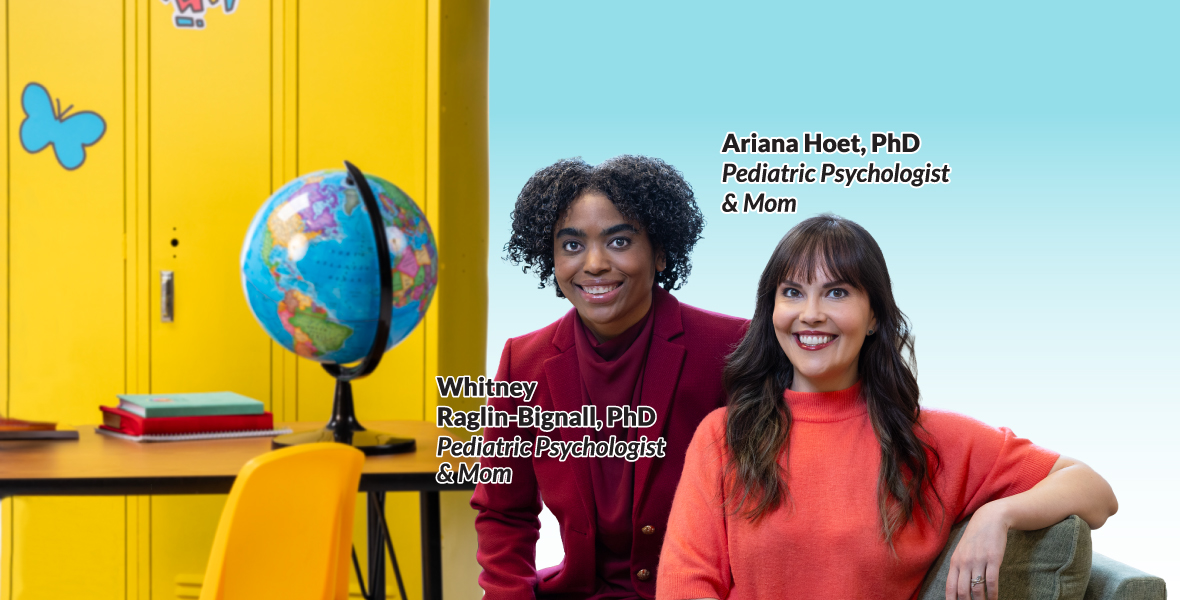 Dr. Ariana Hoet and Dr. Raglin Bignall pose in a classroom setting with a globe and yellow lockers behind.