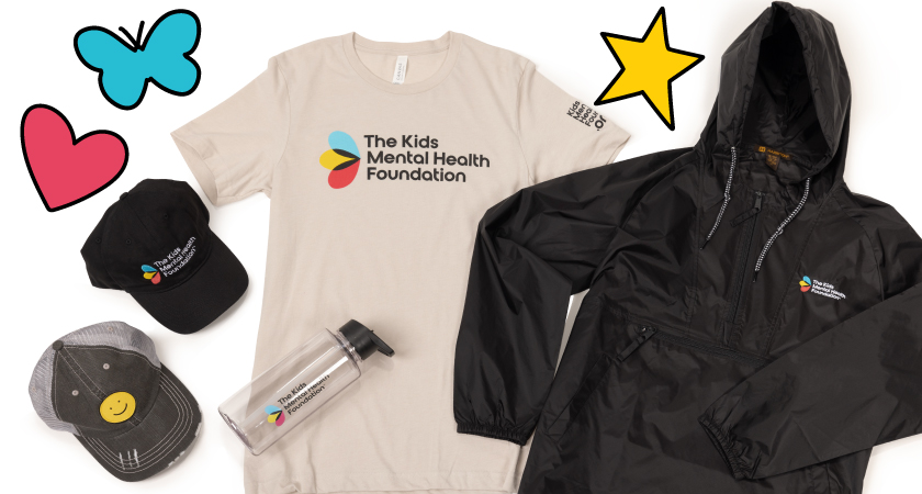 A beige t-shirt, black hoodie, two baseball caps, and a water bottle laid out for display. Surrounded by a heart, butterfly, and star.