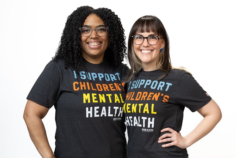 Dr. Bignall & Dr. Hoet in Monthly Donor Tshirt